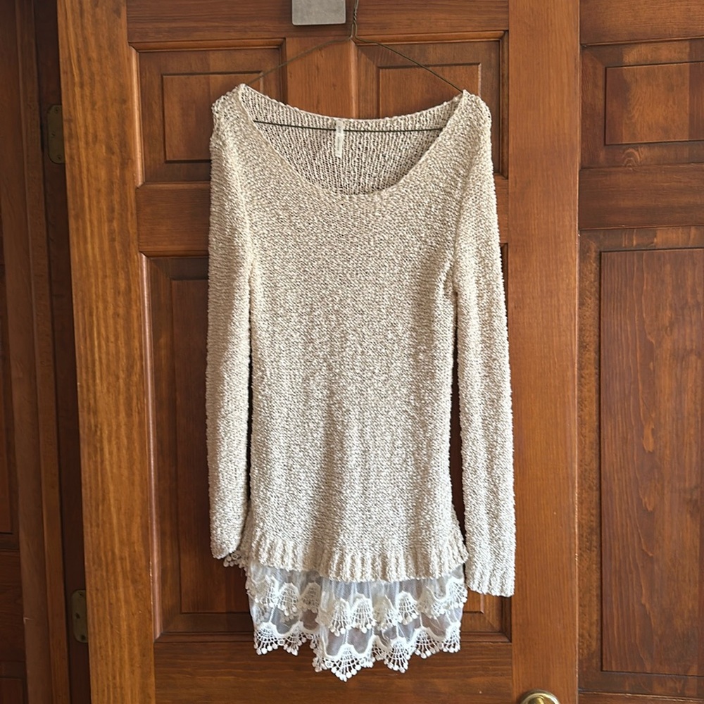 Cream sweater with lace on the bottom